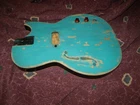 Vintage Ca 1967 Kay Old Kraftsman Hollow-body Gumby Bass Guitar Refin Used. Price: $99.00.