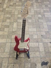 Fender Squier Mini Red Electric Guitar 6 String Rh W Babytailor Gig Bag & Stand Used. Price: $139.95.